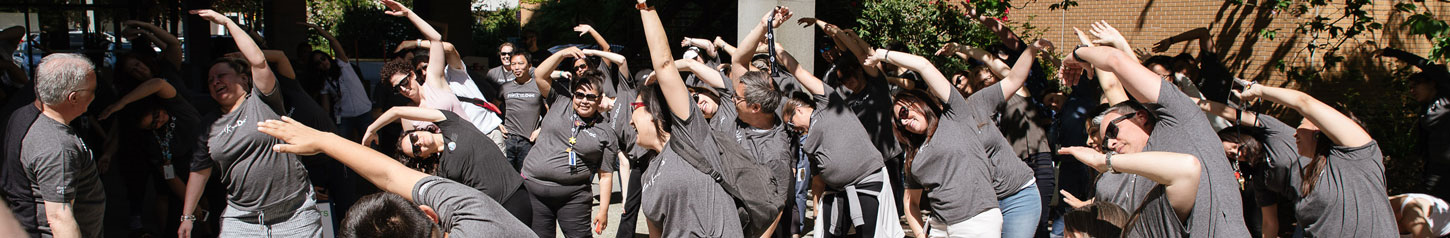 This is a banner photo image of a group of people exercising together. Photo credit: First Nations Health Authority